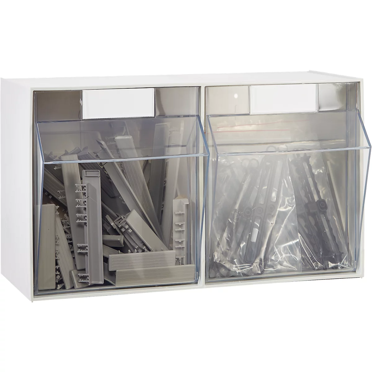 Armoire de rangement blanche avec deux contenants transparents, remplis de pièces en plastique.