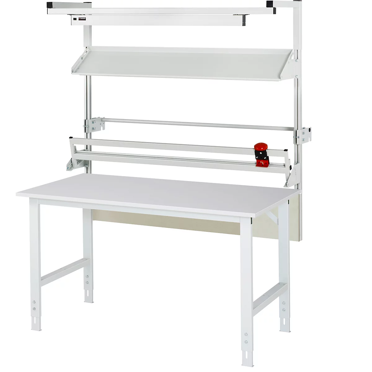 Weißer, industrieller Arbeitstisch mit integrierter Beleuchtung, Regalen und Papierabroller.