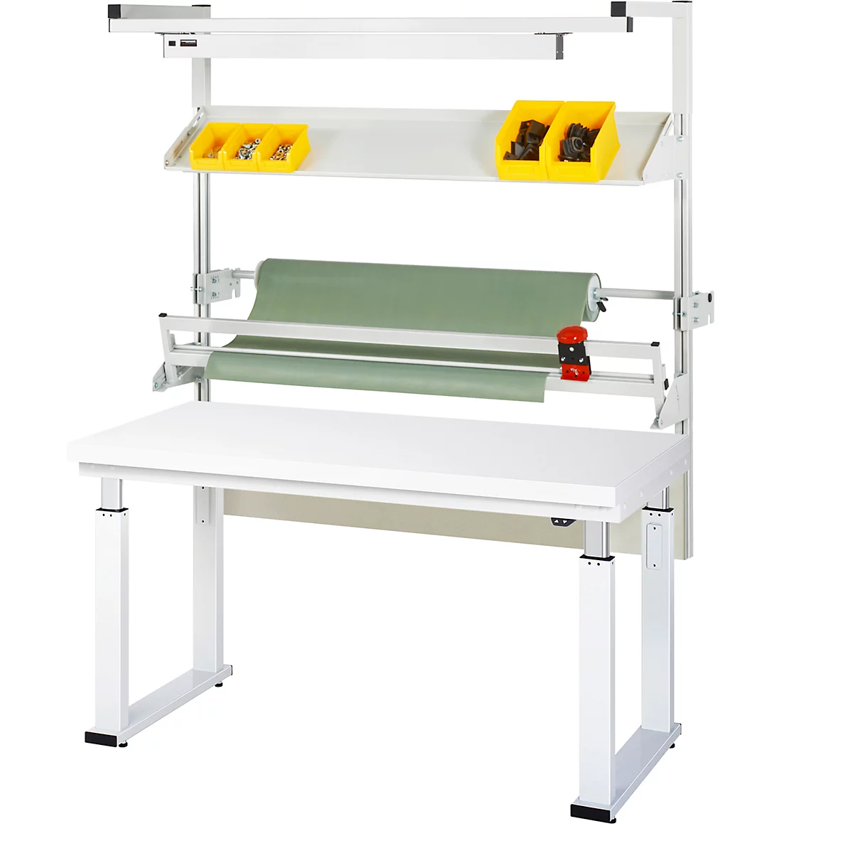 Weißer höhenverstellbarer Arbeitstisch mit Zubehör, grüner Papierrolle und gelben Behältern.