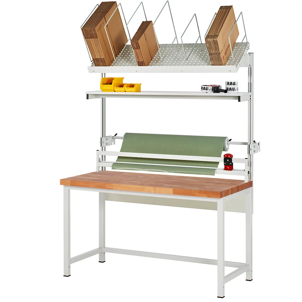 Werkbank mit Ablagen, Papierrolle und Kartons.