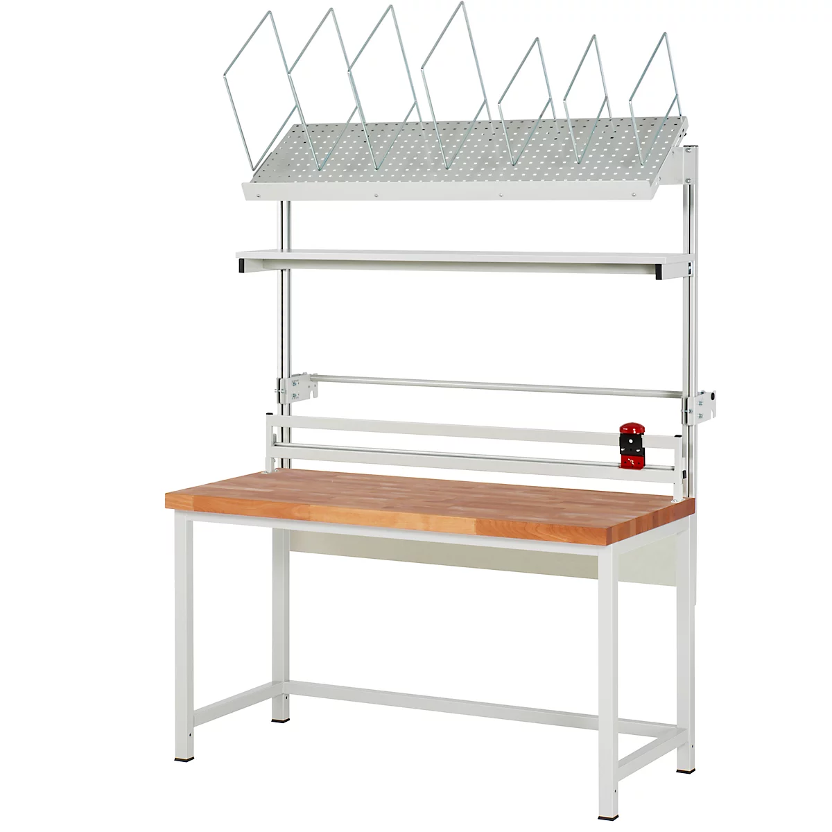 Werkbank mit Holzplatte, weißem Metallgestell und Regalen. Oben befindet sich ein Gitter für Papiere. Links ist ein Papierrollenhalter.