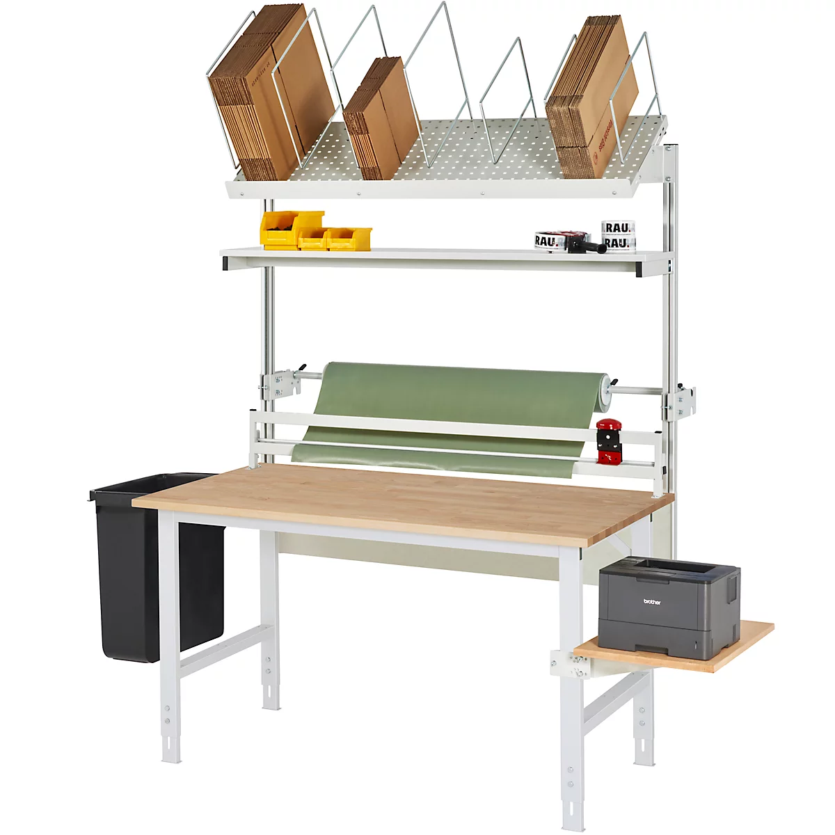 Ein weißes Packtischsystem mit Pappkartons, gelben Behältern, einem Abfallbehälter, einer Rolle Papier und einem Drucker.