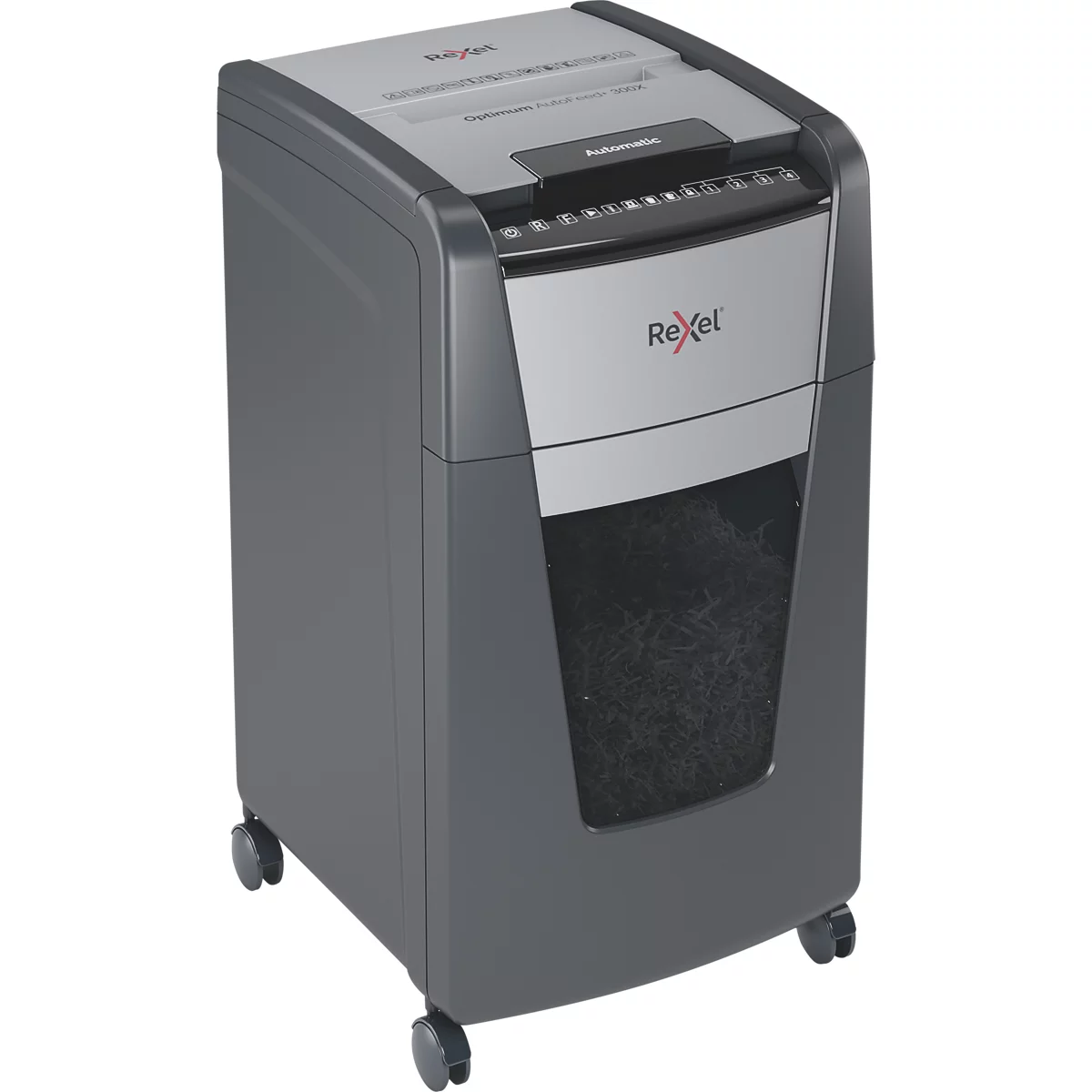 Grey paper shredder with wheels. The Rexel logo is clearly visible. The collection bin is half full of shredded paper.