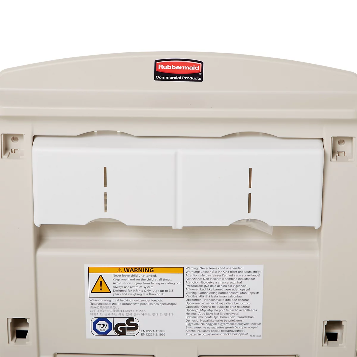 Nahaufnahme einer beigefarbenen Wickelauflage mit zwei weißen Ablagen. Warnhinweise und Logo sind zu sehen.