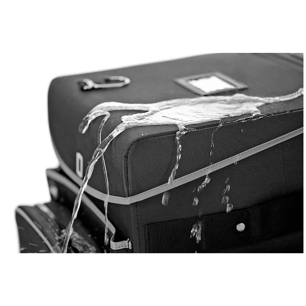 Black bag with water beading off.