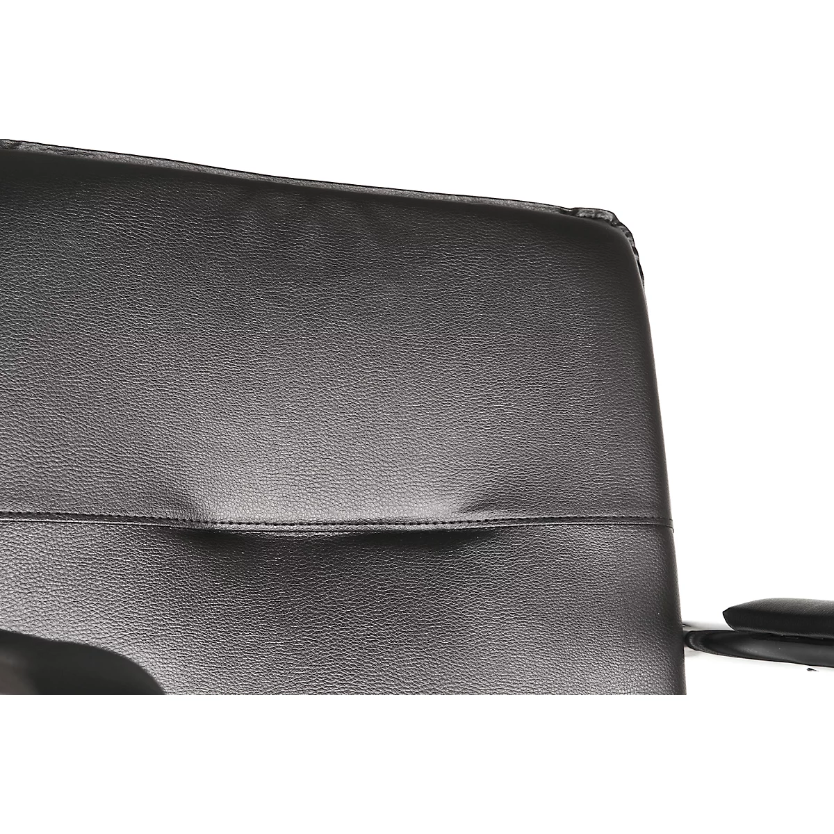 Close-up of a black office chair: the leather backrest with a horizontal seam.