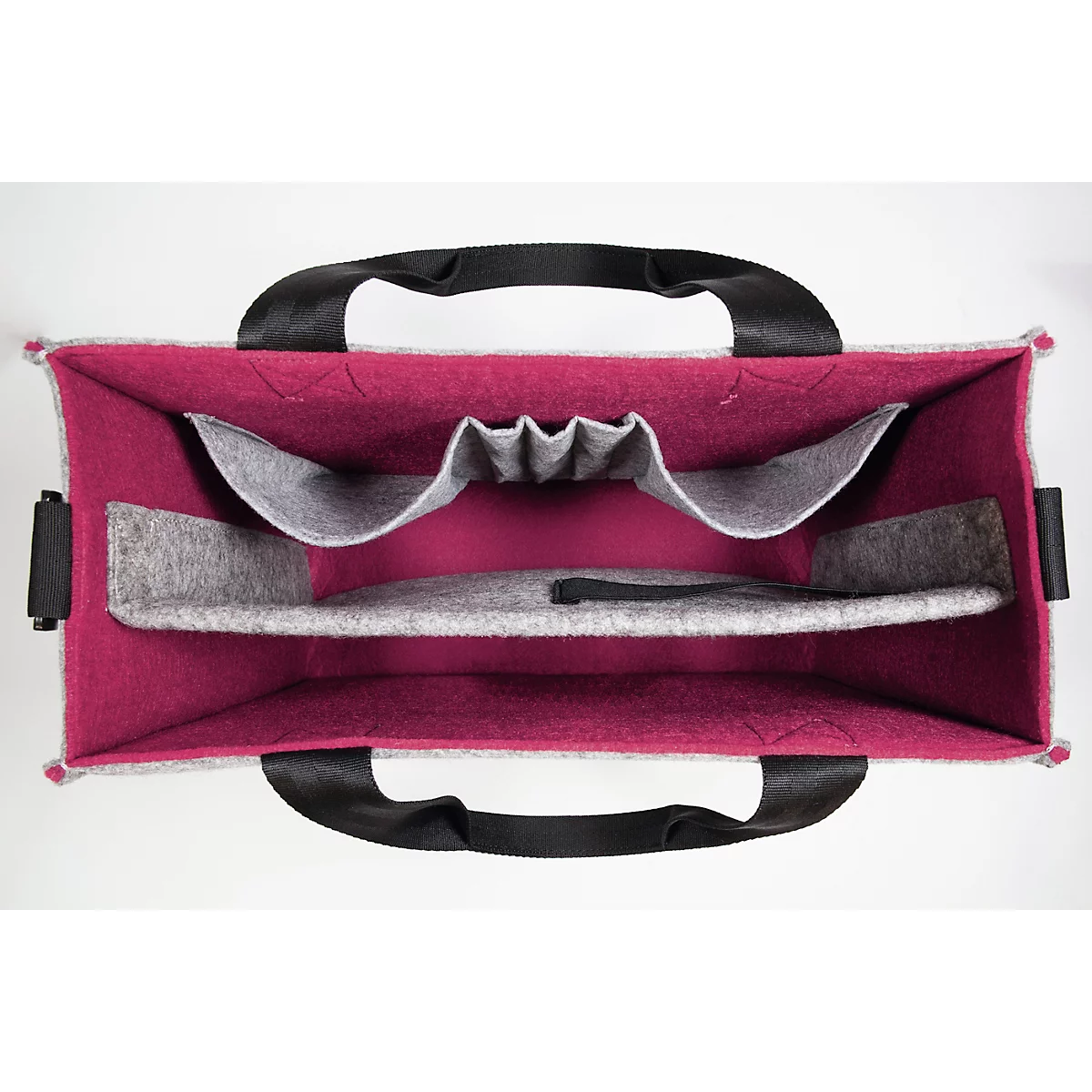 Vue intérieure d'un sac en feutre. Doublure rose, compartiments gris, poignées noires.