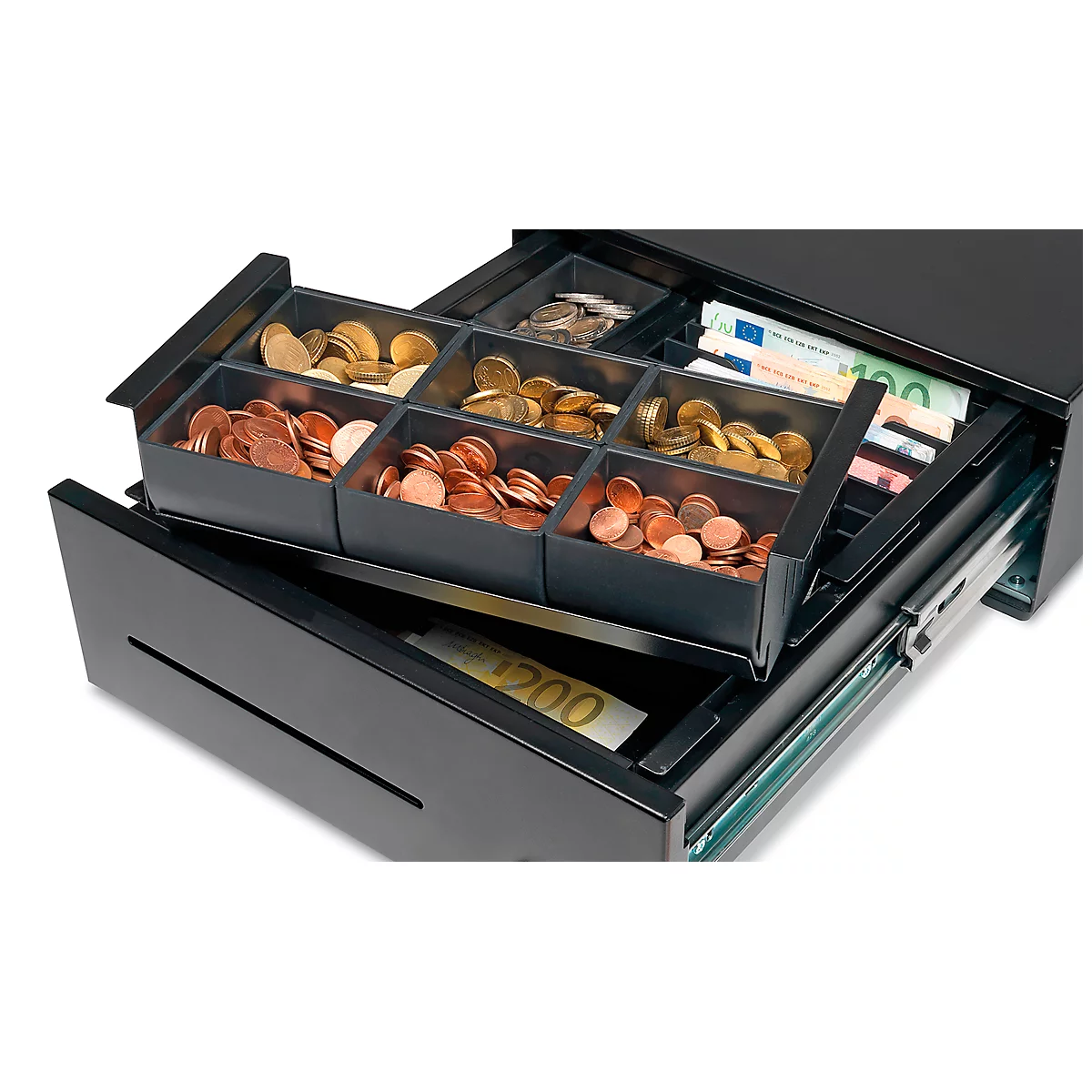 Open cash register filled with coins and banknotes. Copper coins are in the foreground, with gold and silver coins behind.