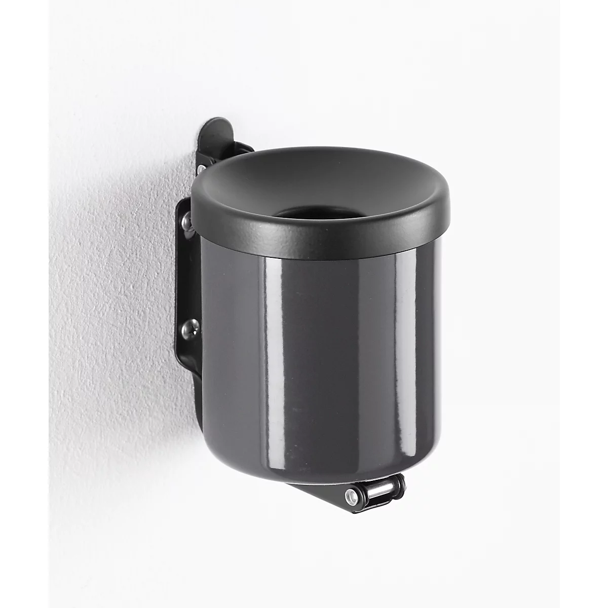 Gray wall-mounted ashtray with round lid and black holder. It's attached to a white wall.