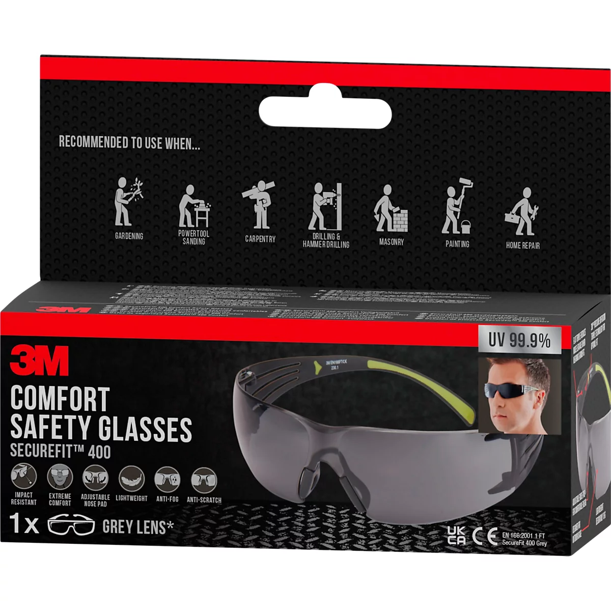Eyeglasses on product packaging. Printed labels show 3M Comfort Safety Glasses Securefit 400, grey lenses, and recommended uses.