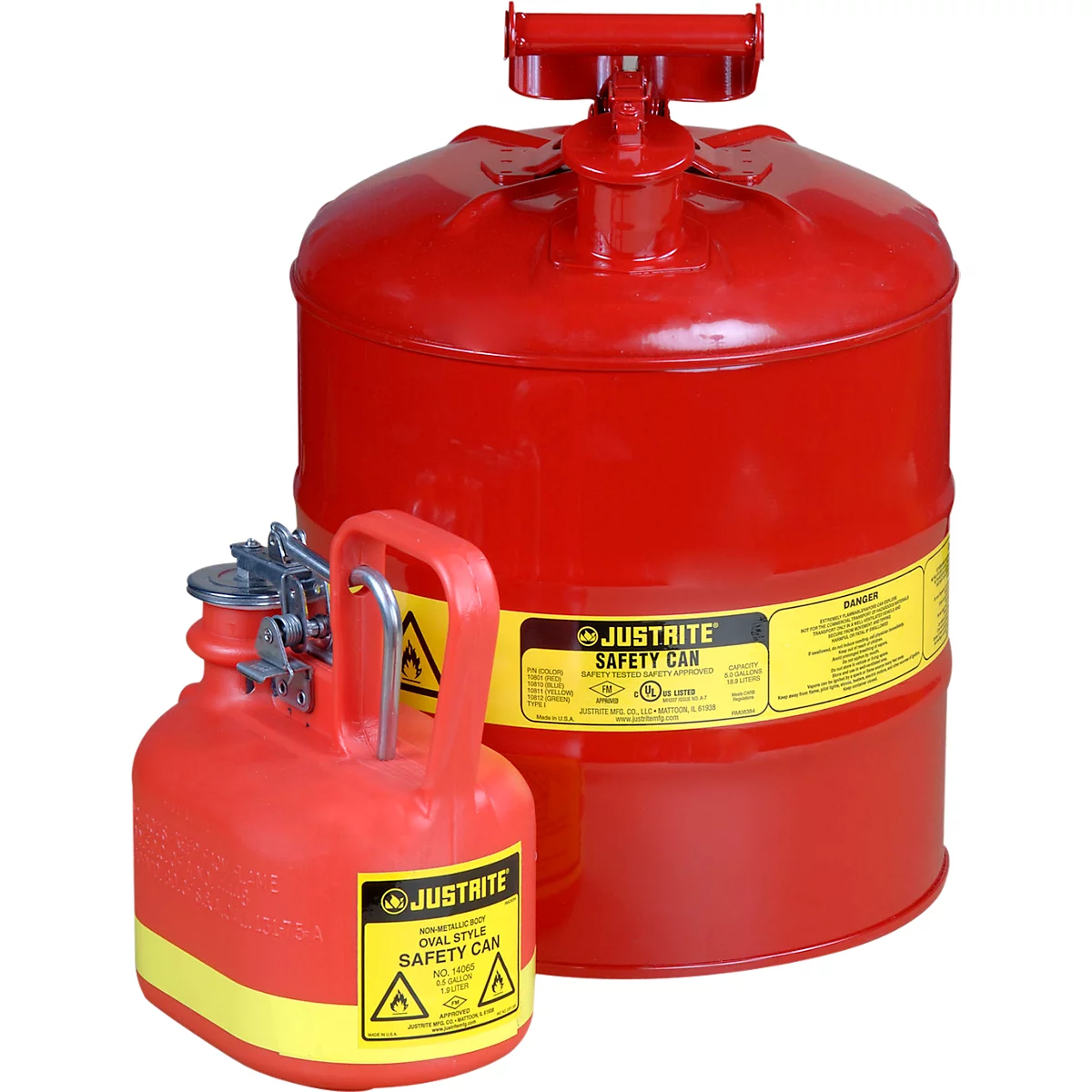 Two red safety cans with yellow labels and warning signs, standing side by side.