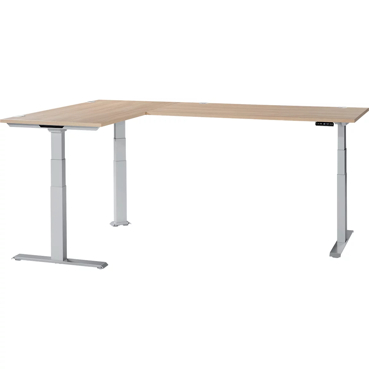 An L-shaped desk, light brown tabletop on a silver, height-adjustable frame.