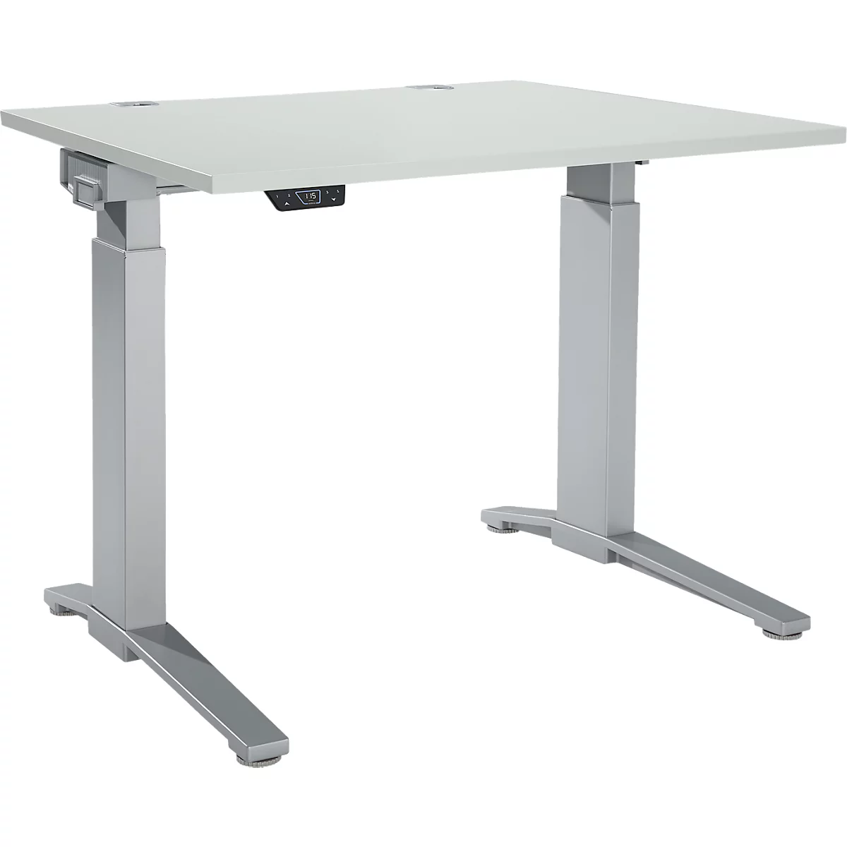 A height-adjustable desk, light grey tabletop, grey legs.