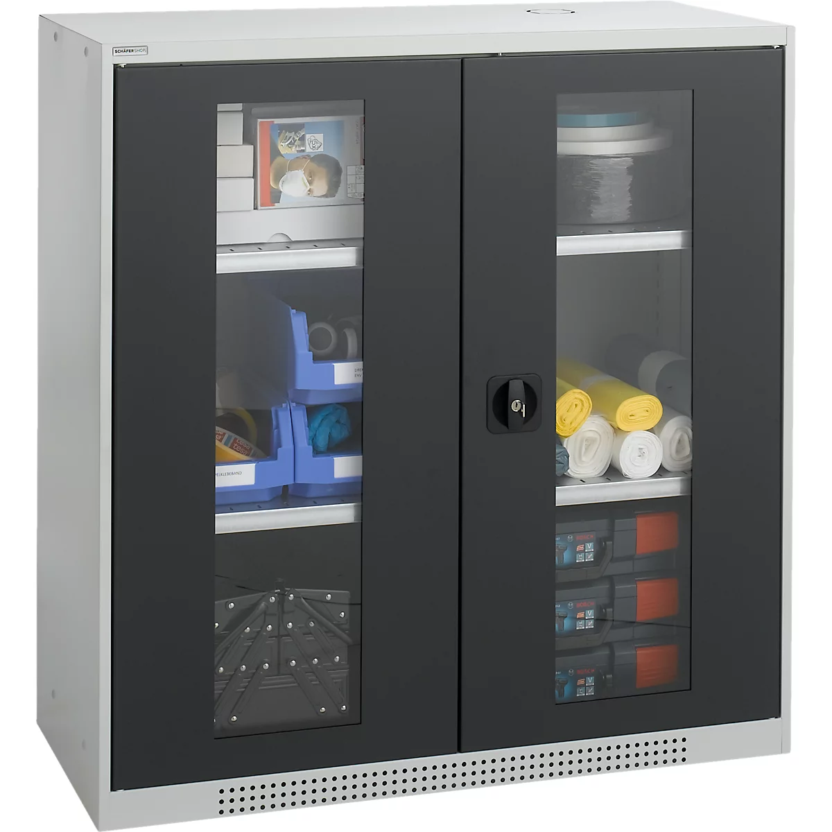 Cabinet with two glass doors, filled with items.