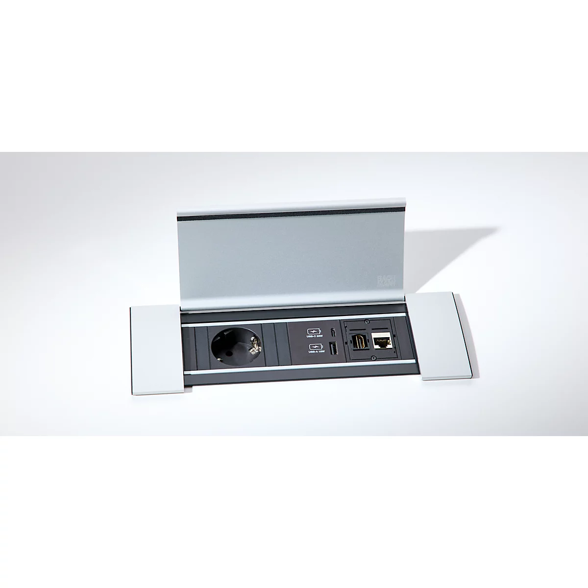 Einbau-Steckdoseneinheit mit Schuko-Steckdose, USB-Ports und LAN-Anschluss in einem grauen Metallgehäuse.