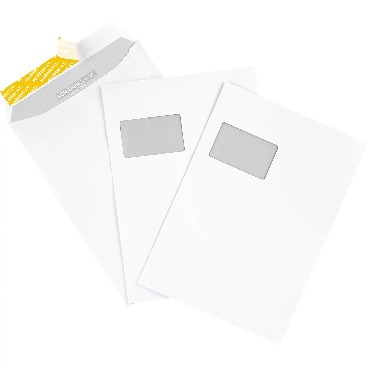 Three white envelopes, two with windows, are overlapping.