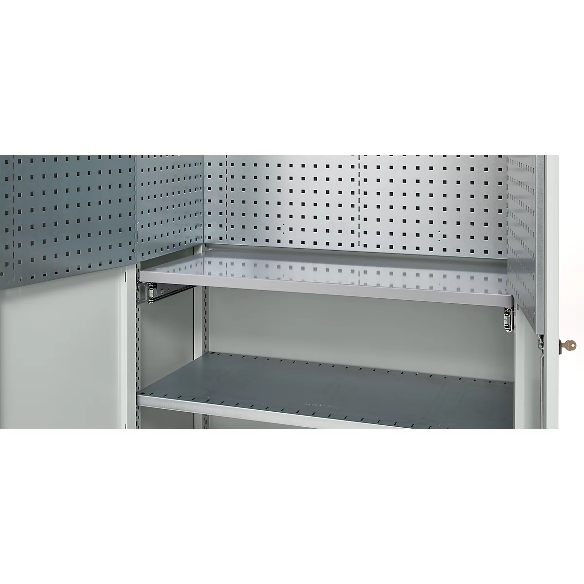 Open tool cabinet, gray metal shelves, perforated walls.