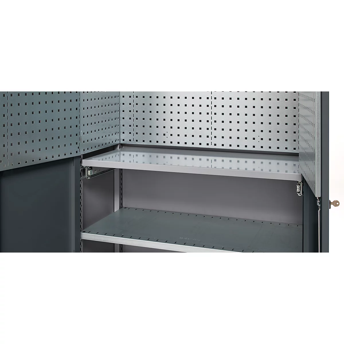 Metal tool cabinet with perforated walls and shelves.