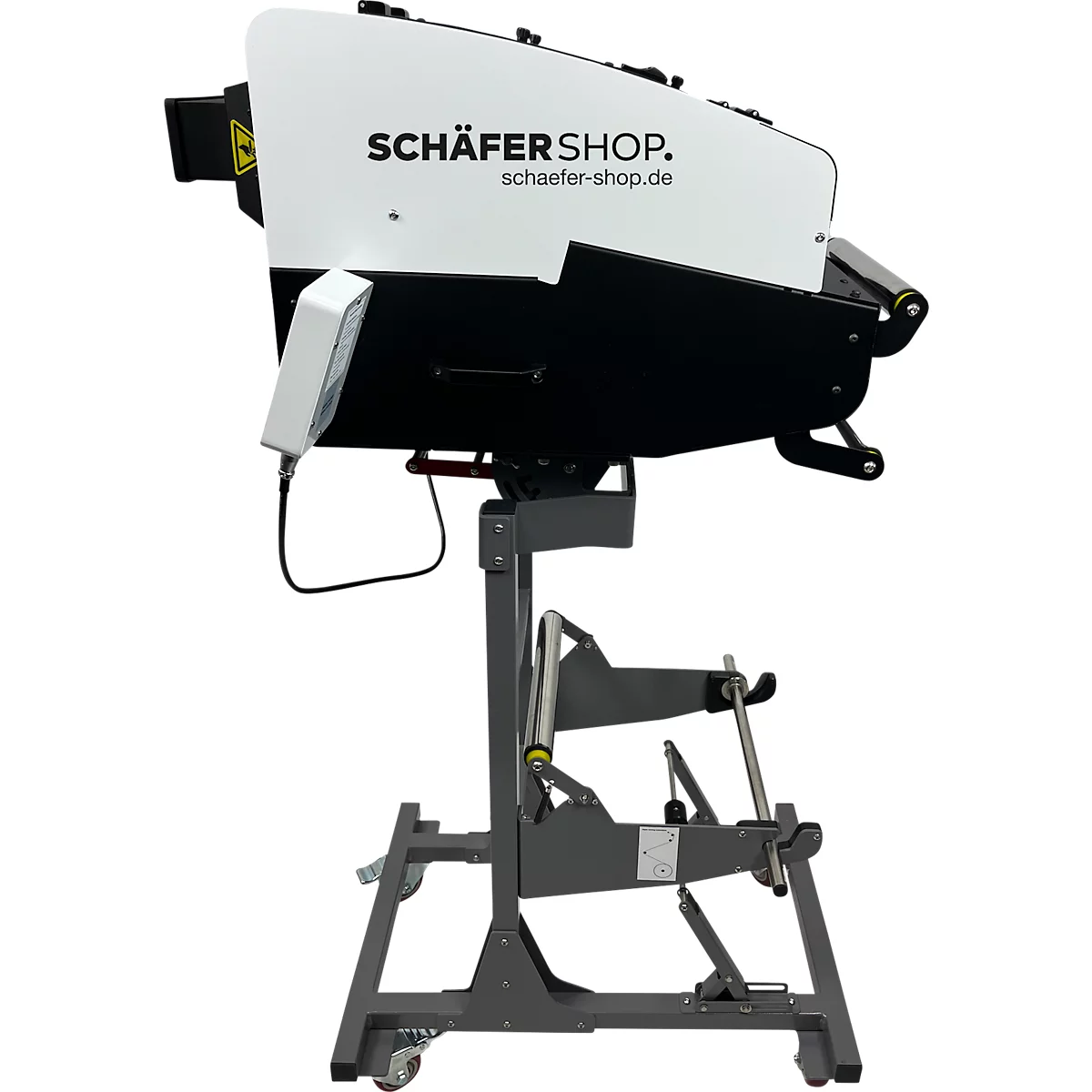 Een verpakkingsmachine met een witte en zwarte behuizing, met de tekst "activaPaper". Het staat op een grijs statief met wielen.