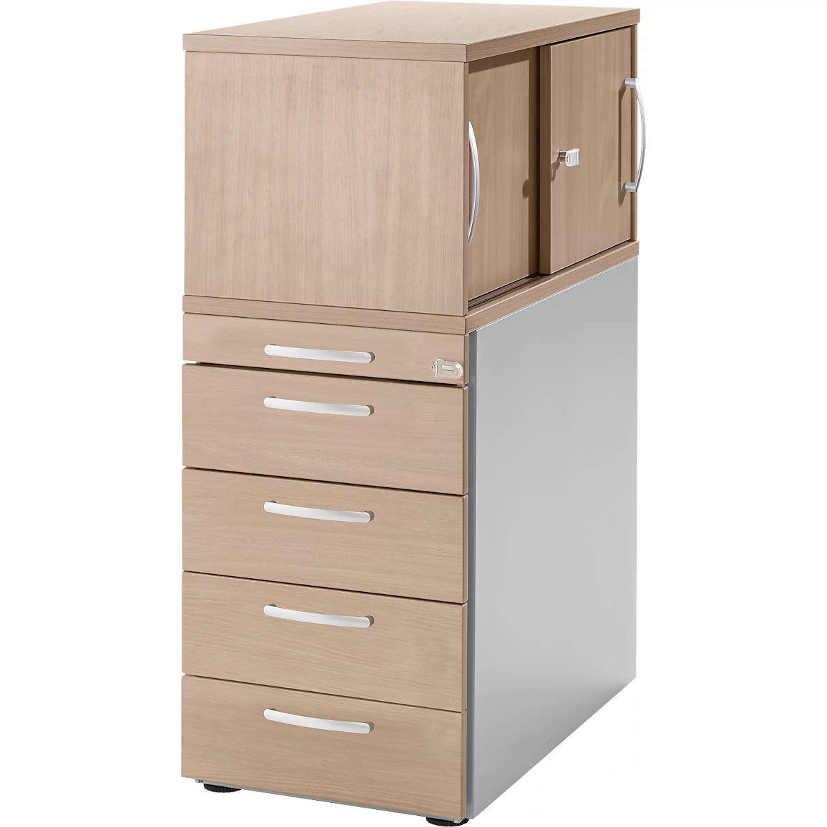 Two-part cabinet with drawers and cabinet doors. Wood-colored, silver handles. Stands on gray feet.