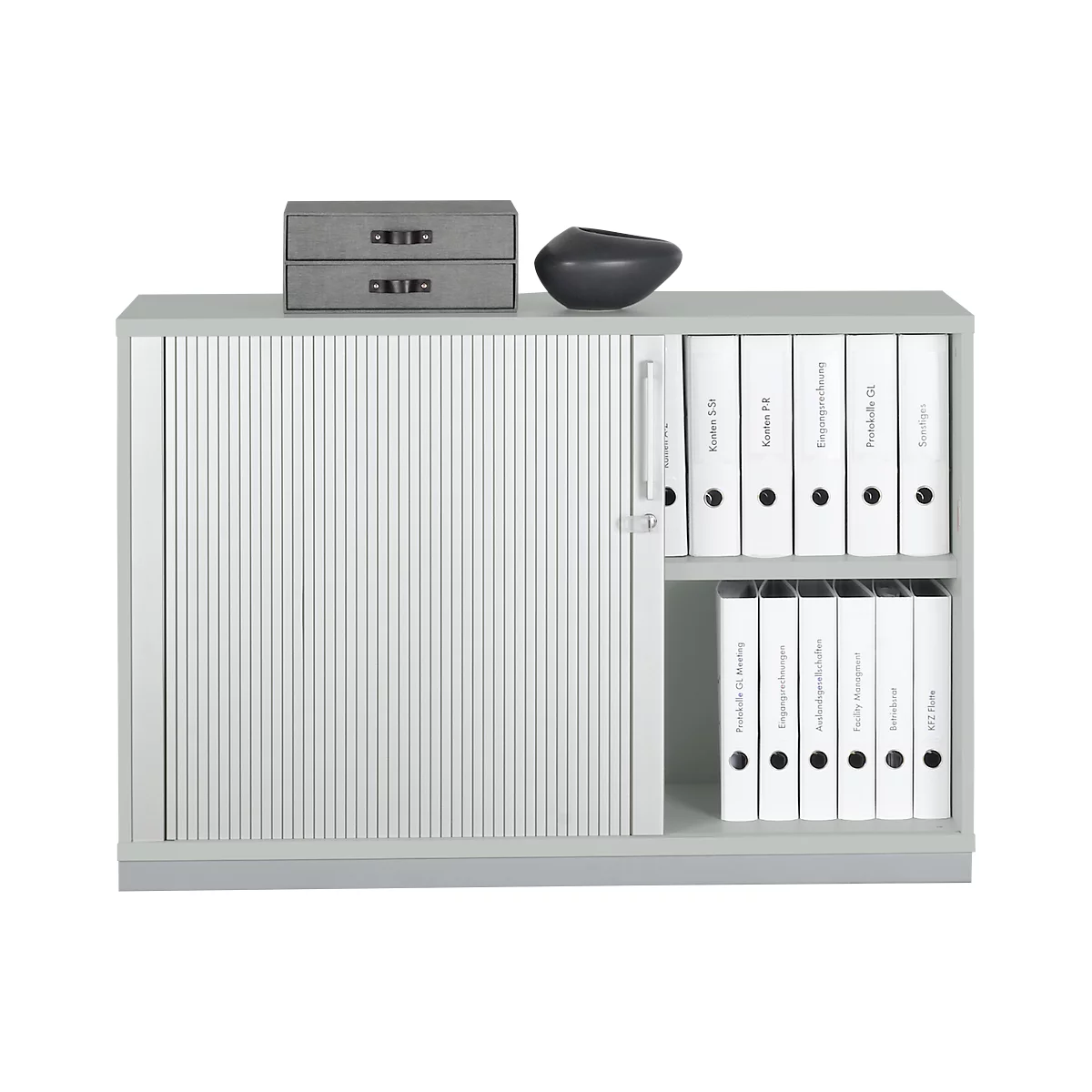 Gray filing cabinet with sliding door and white binders on the shelf.