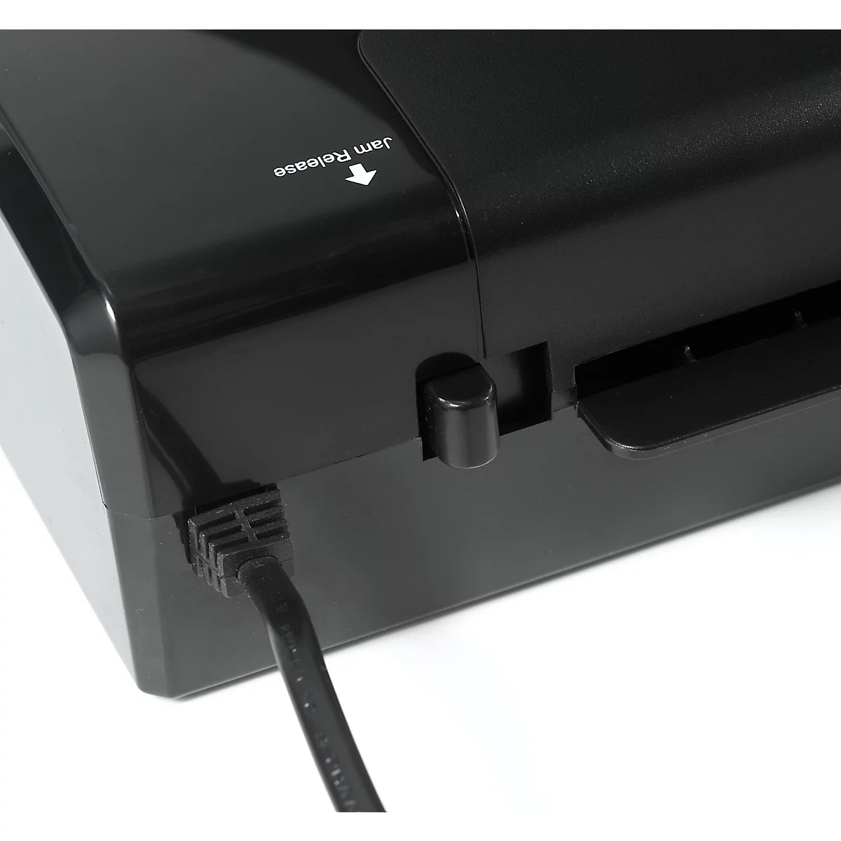 Detail shot of a black laminating roller. The top says "Jam Release" in white letters.