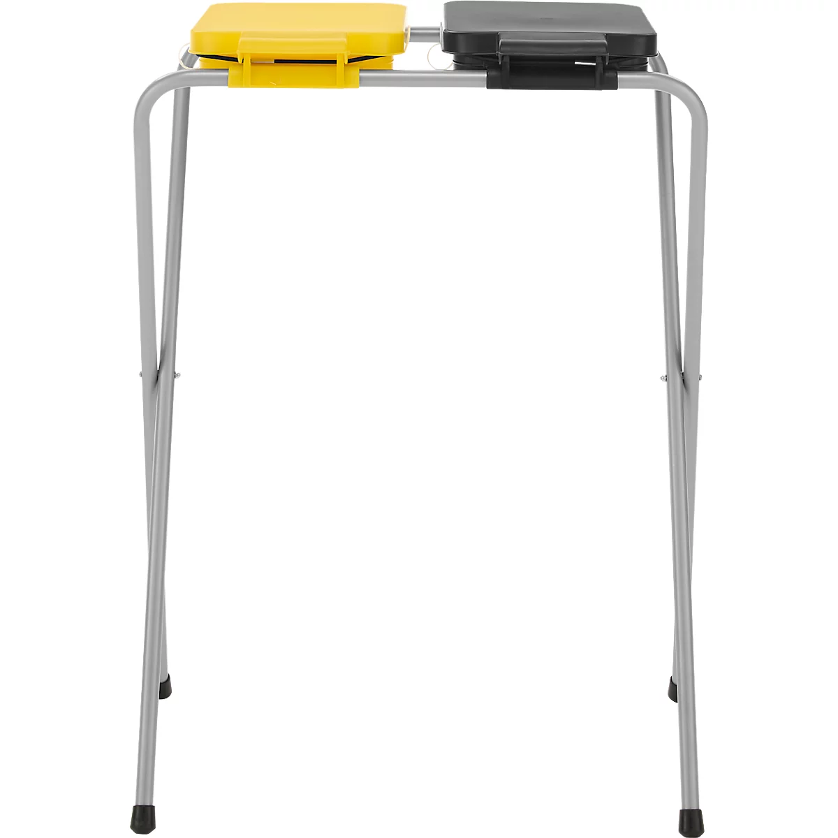 Ein Tisch mit zwei Boxen, eine gelb und eine schwarz. Der Tisch ist silbern.