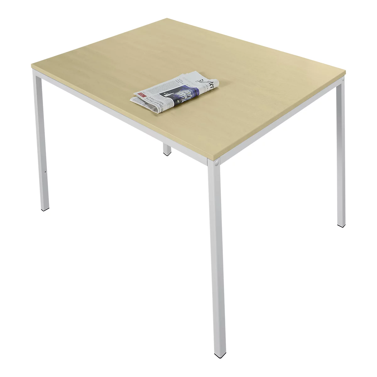 A rectangular table with a light brown wooden top and white metal legs. A newspaper is lying on the table.
