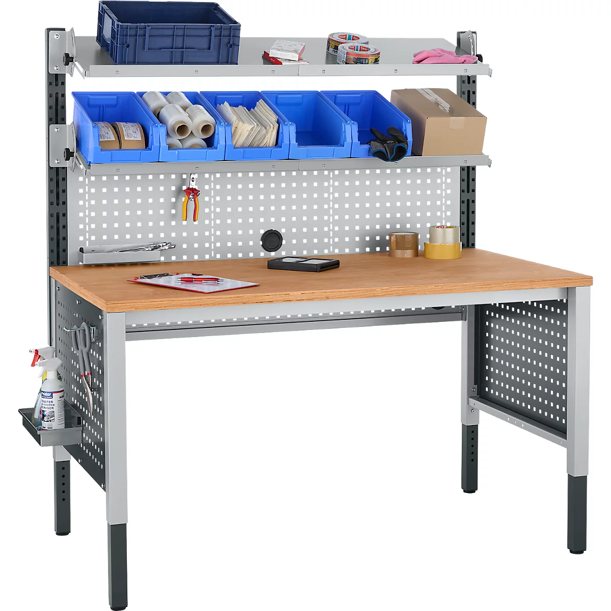 Werkbank met gatenbord, laden, gereedschap en diverse materialen.