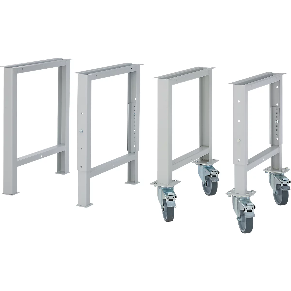 Four gray metal frames, two without wheels, two with wheels. The left frame has no wheels, the other three have wheels.