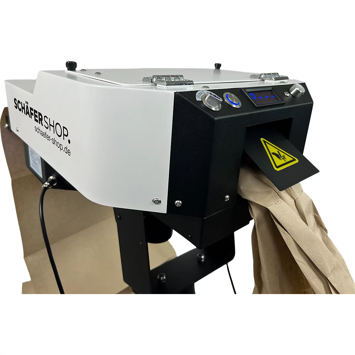 Machine die papier in een zak afgeeft. De machine heeft 'activaPaper' erop afgedrukt.