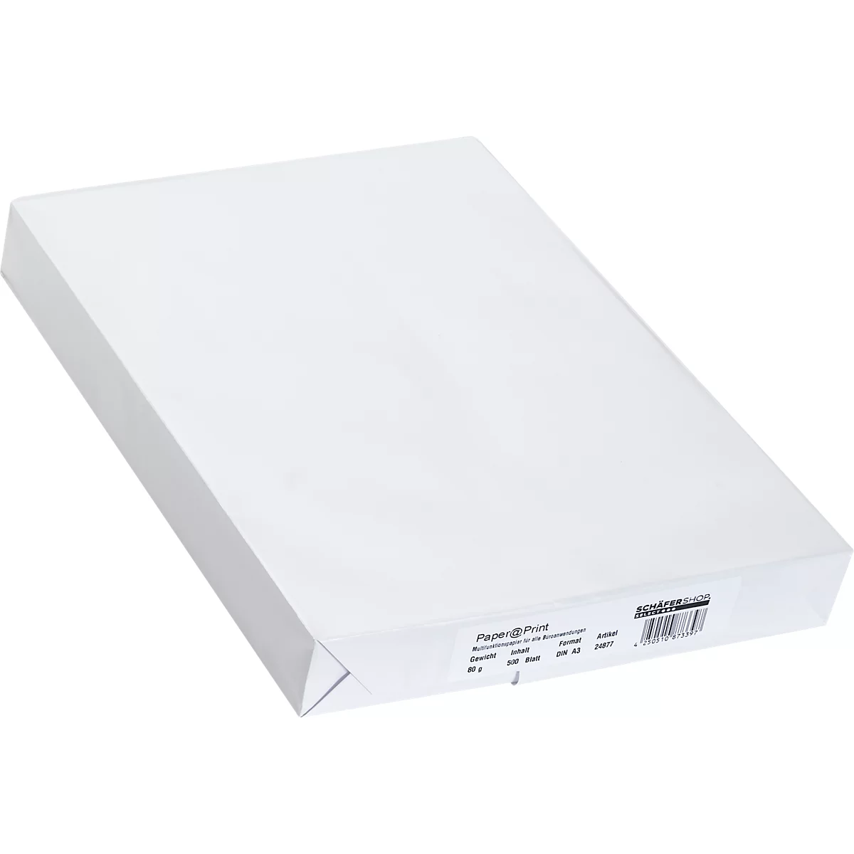 A stack of white paper in a package. There is a label with information and a barcode on the packaging.