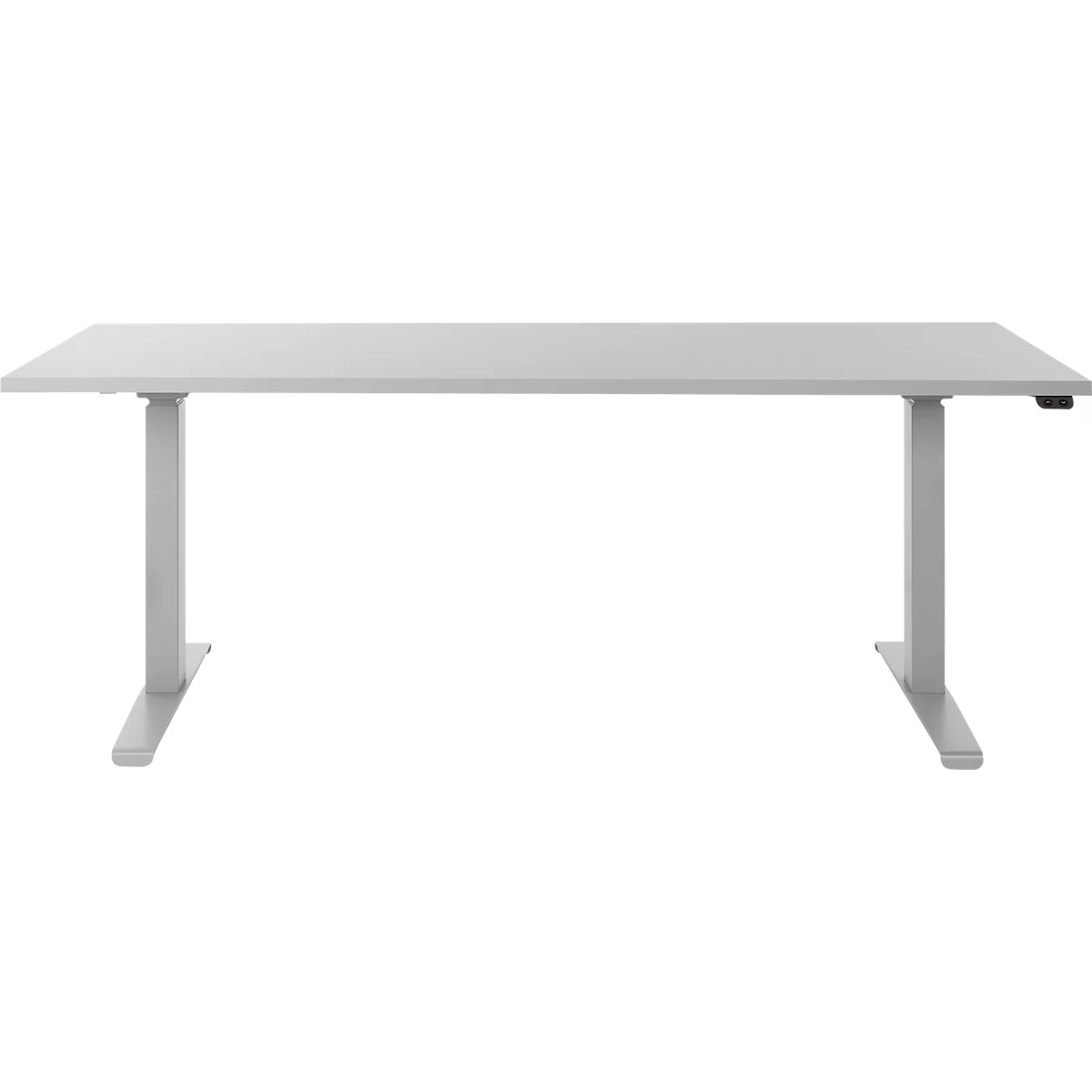A white height-adjustable desk with two legs. The table is rectangular, the legs are slightly trapezoidal.