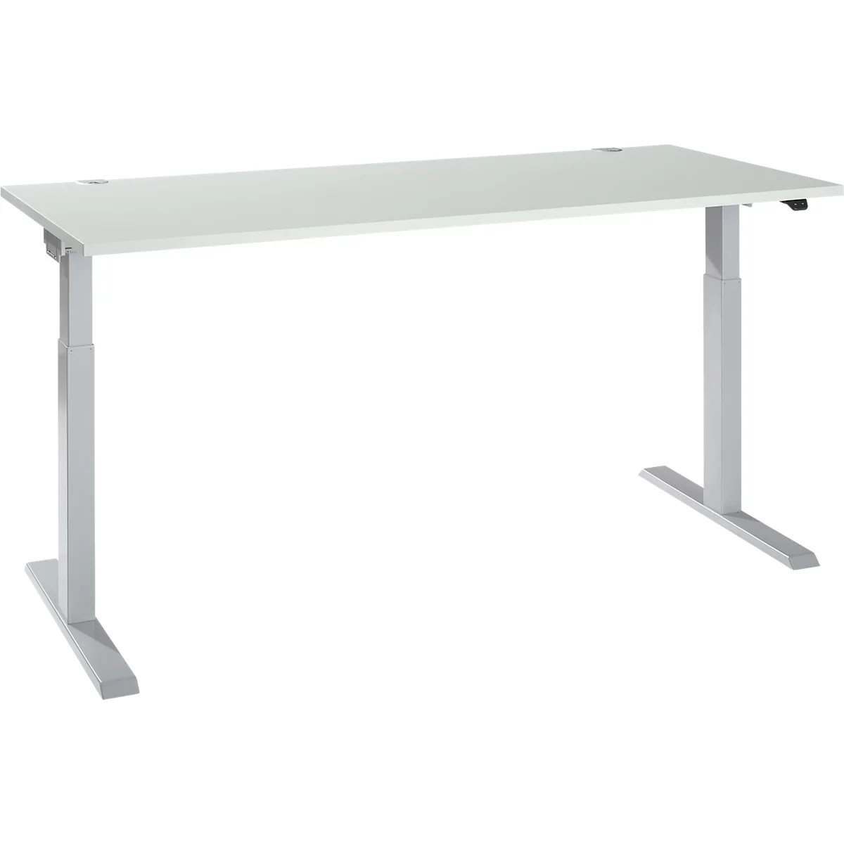 A white, height-adjustable desk with silver legs.