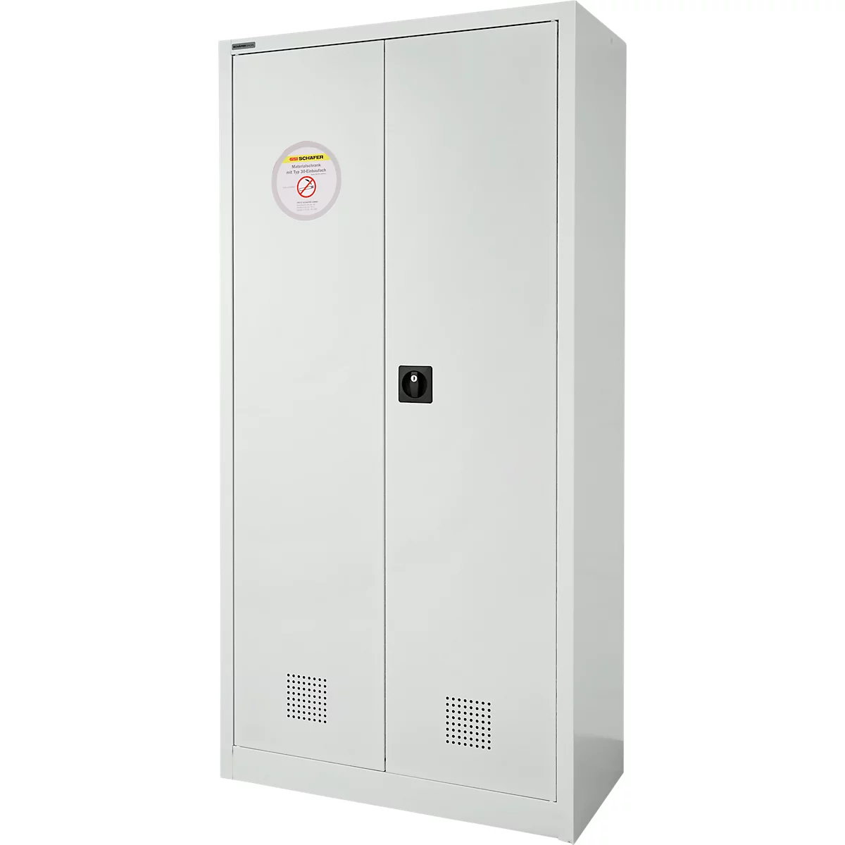 Witte metalen kast, twee deuren, zwarte handgreep. Sticker met rood verbodssymbool.