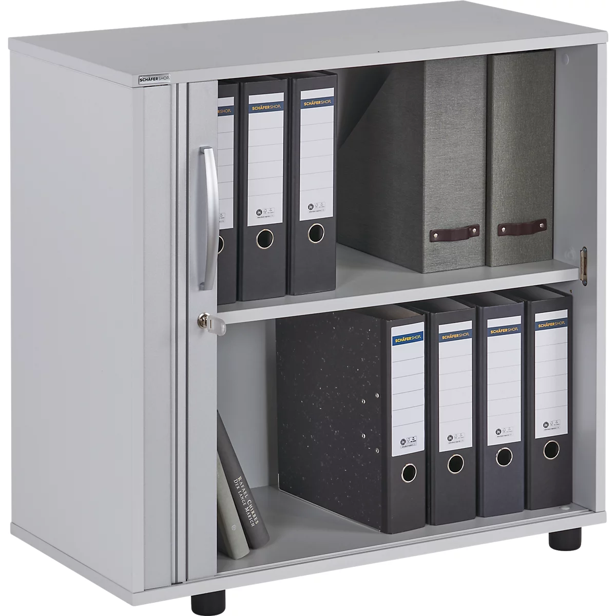 Grey filing cabinet with open door. Filled with file folders and books. Small, black base.