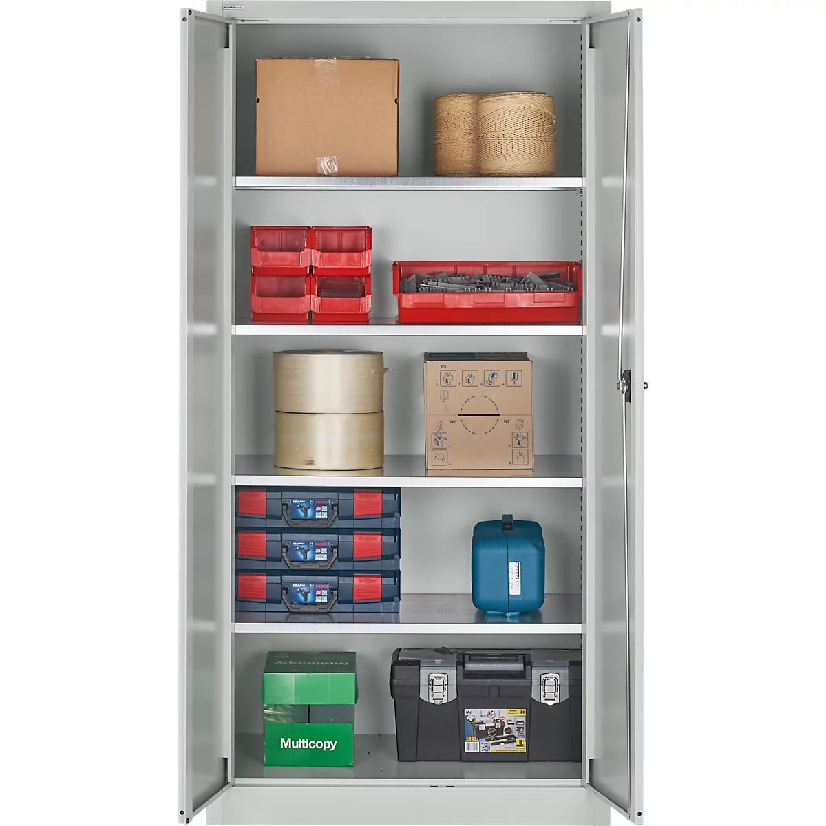 Open cabinet with various stored materials, including cardboard boxes, toolboxes, and plastic containers.