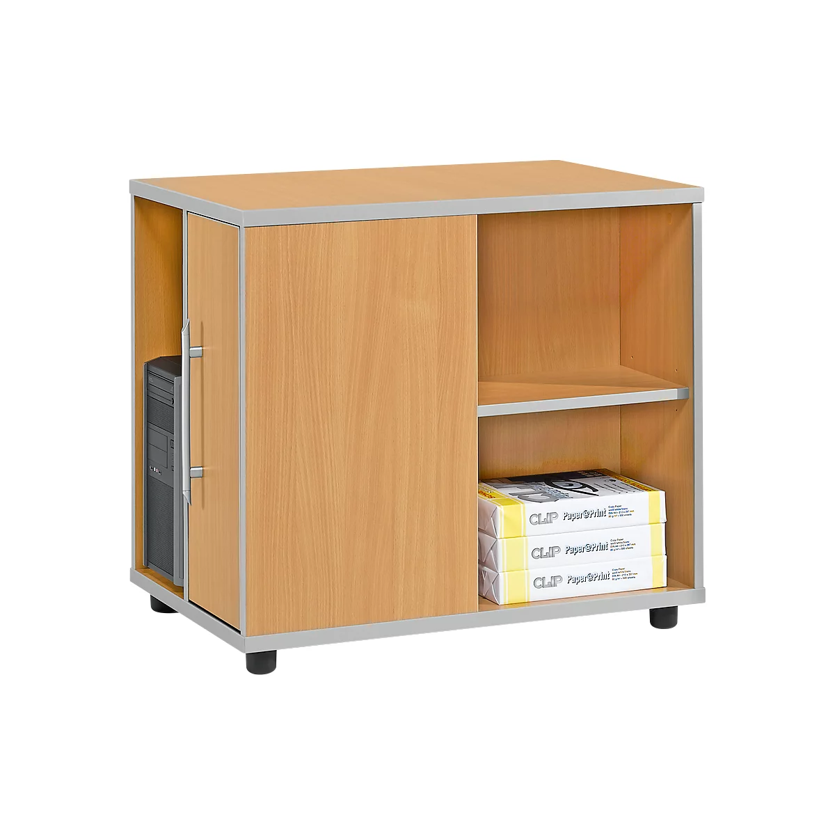 A light wood computer table with a compartment for the computer, a shelf, and stacks of paper.