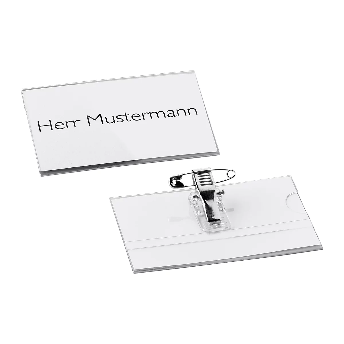 Two name badges. One with the inscription 'Herr Mustermann'. The second with a safety pin.