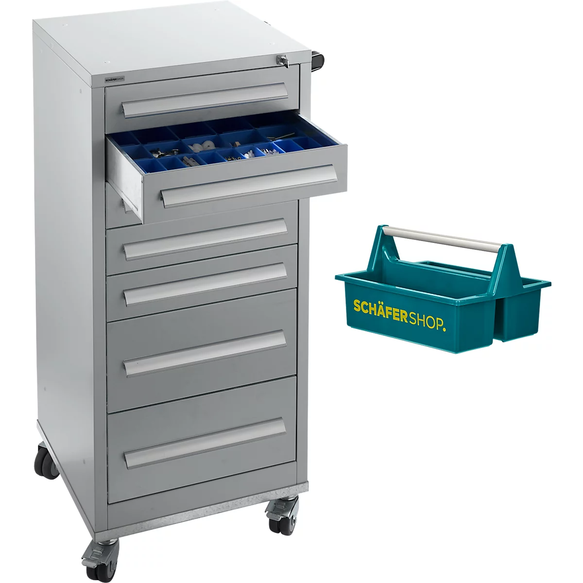 Grauer Werkzeugschrank mit geöffneter Schublade und blauer Einteilung, daneben eine grüne Werkzeugkiste mit Griff.