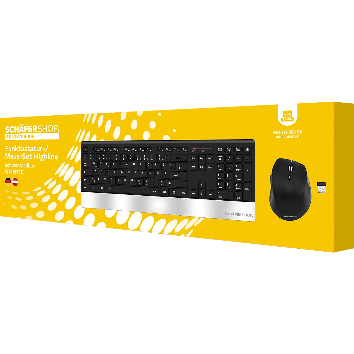 Un ensemble clavier-souris noir, emballé dans une boîte jaune. Le clavier a une barre argentée. Une souris est située à droite.