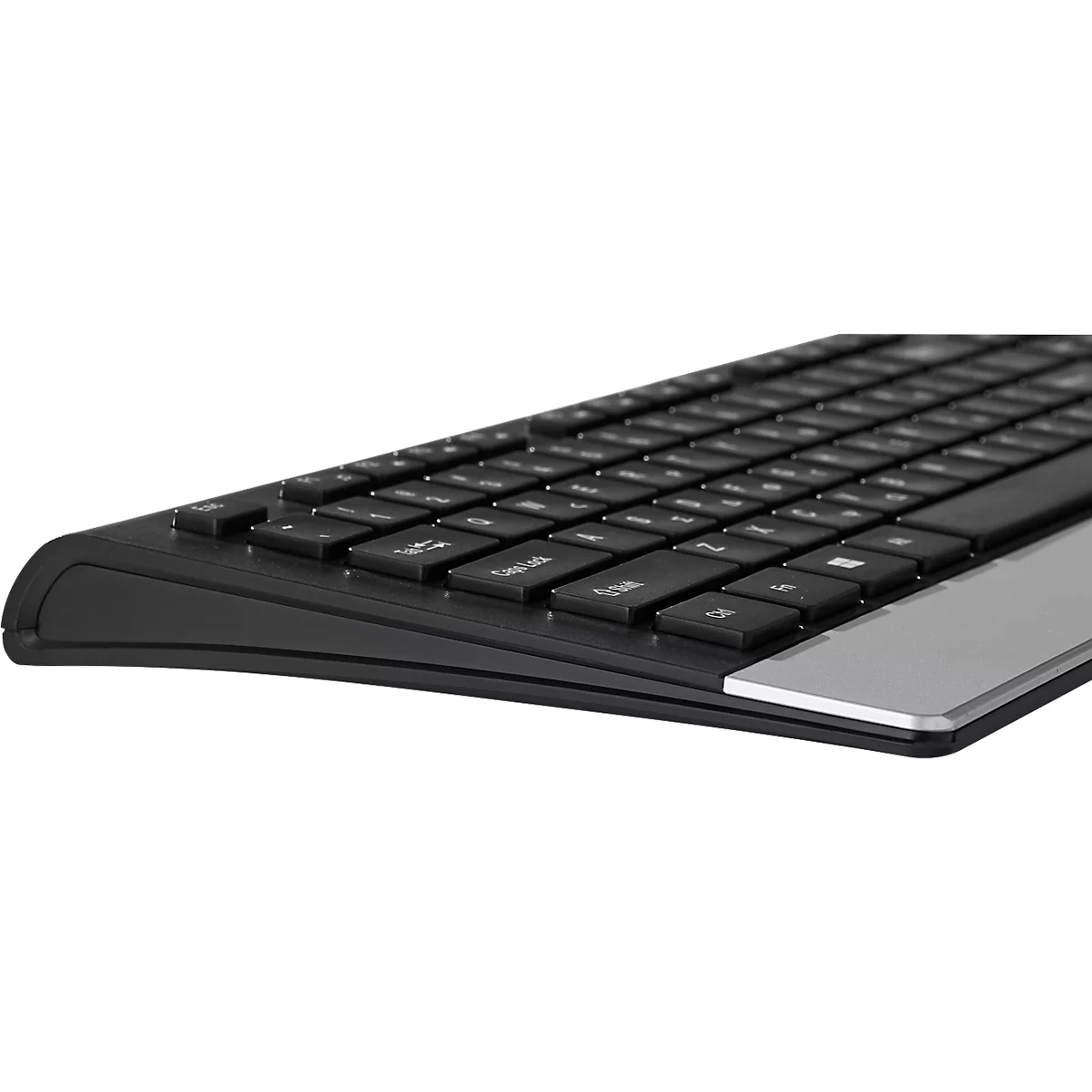 Side view of a black keyboard. Silver area at the bottom.
