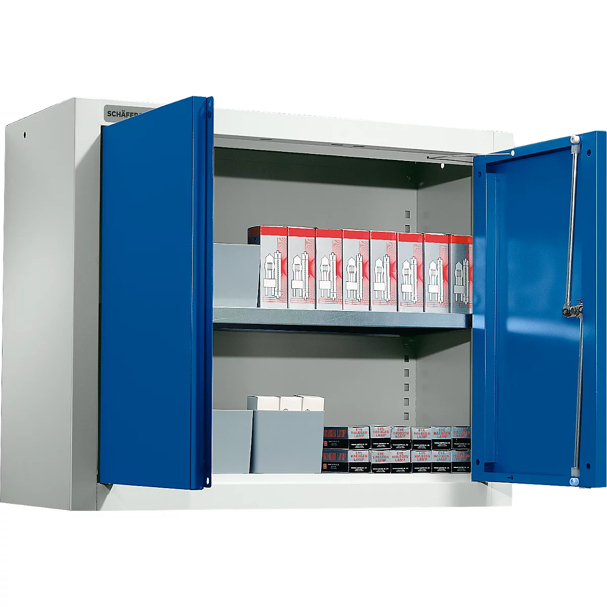 Open cabinet with blue doors. Shelves with red and gray boxes. Lettering: Schäfer.