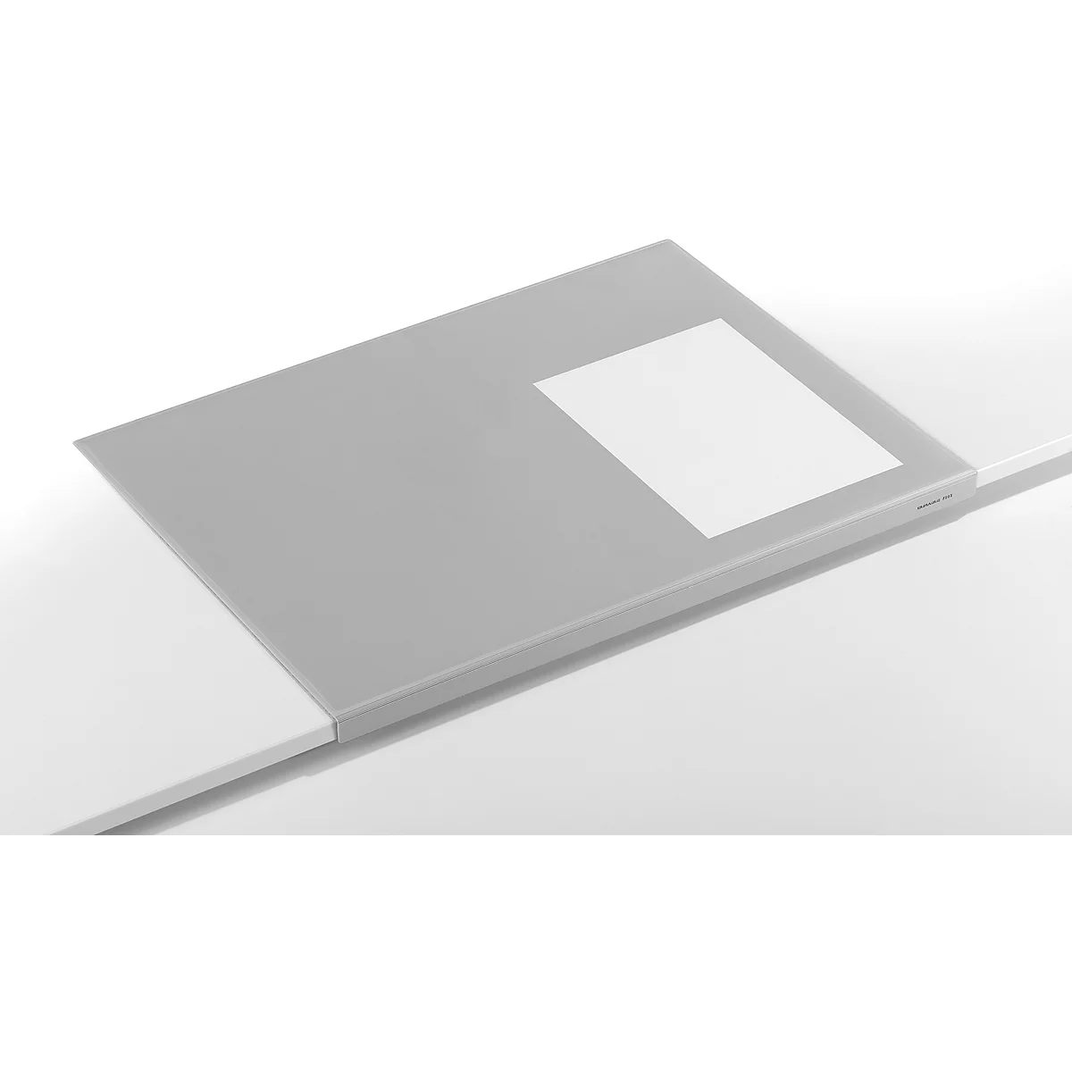 Grijs boek op een witte tafel. Een witte rechthoek op de kaft.