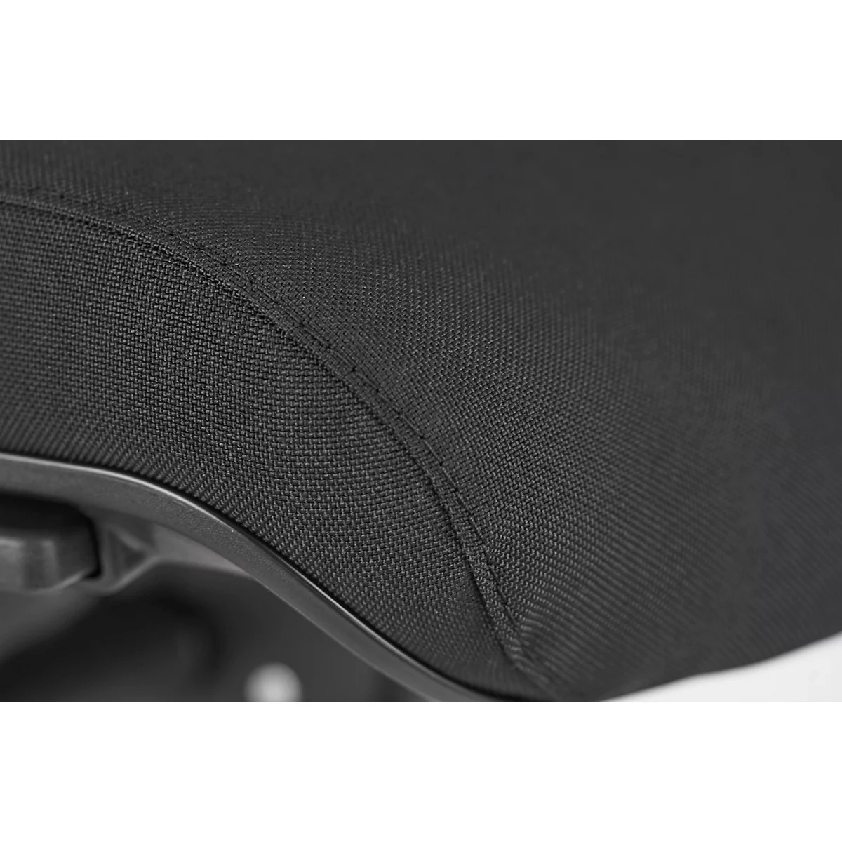 Close-up of a black chair seat with stitching details and black frame.