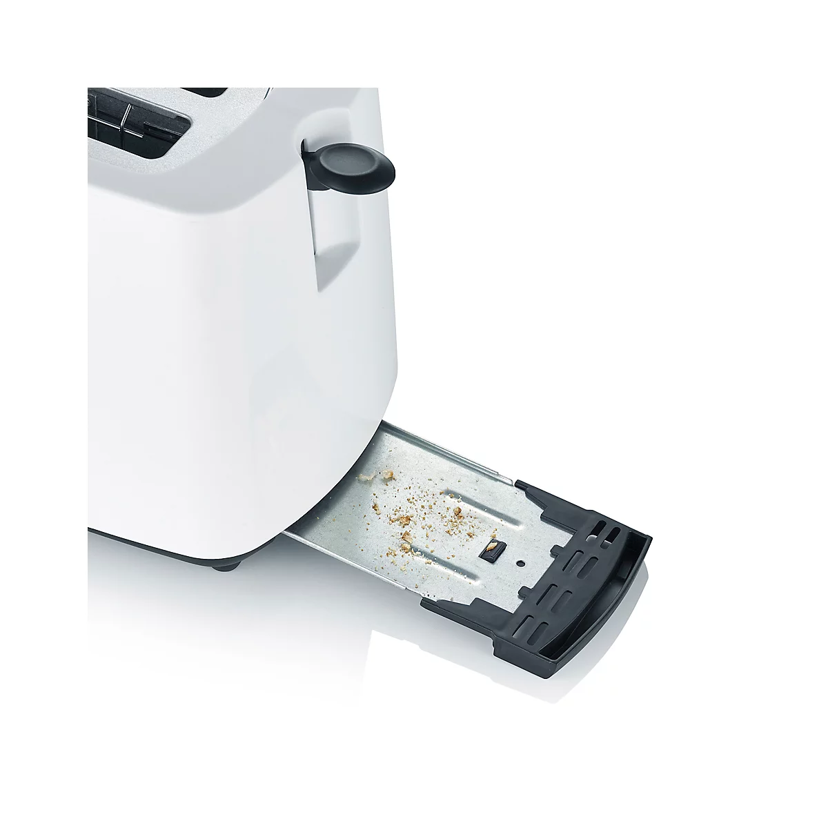 Close-up of a white toaster, the crumb tray is open and filled with crumbs.