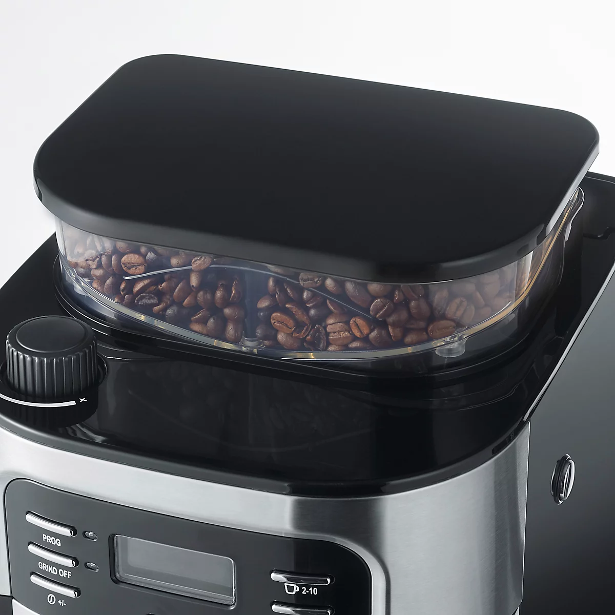 Nahaufnahme einer Kaffeemaschine, die Kaffeebohnen in einem transparenten Behälter zeigt.