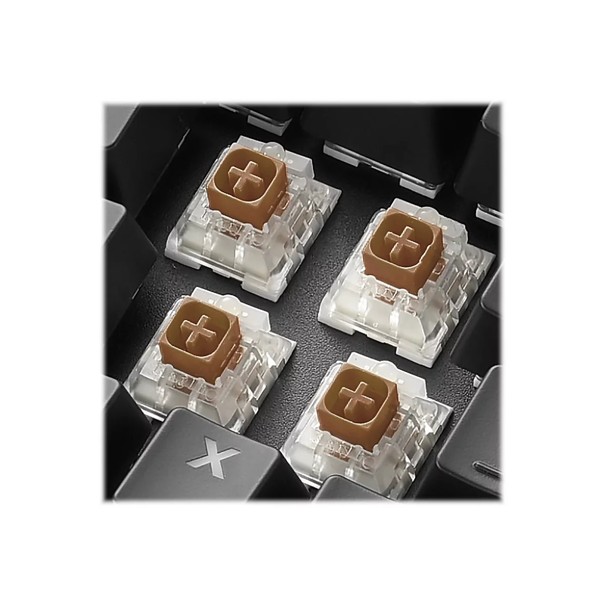 Nahaufnahme von vier braunen und weißen Tastaturschaltern, die umgeben von schwarzen Tasten angeordnet sind. Auf einer Taste ist ein weißes X zu sehen.