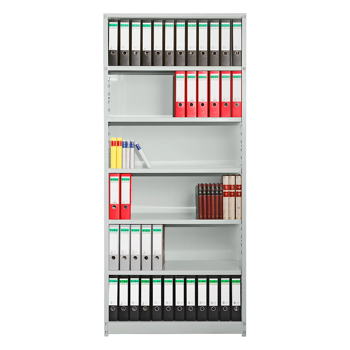 Grey shelving unit filled with files, books, and loose paper. Some files are red, others black or white with green or white labels.