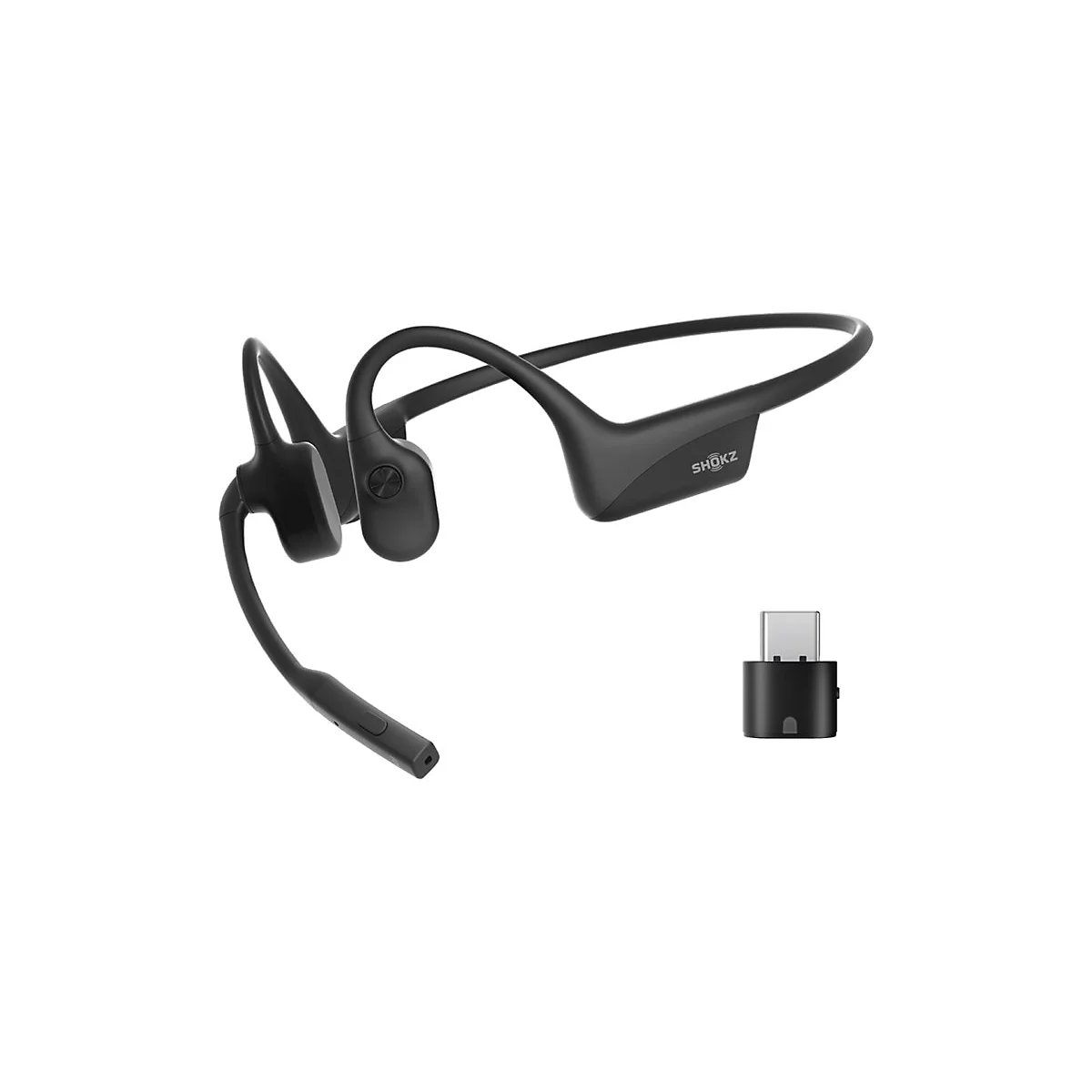 Schwarzer Knochenschall-Kopfhörer, daneben ein USB-Dongle. Auf dem Kopfhörer steht SHOKZ.